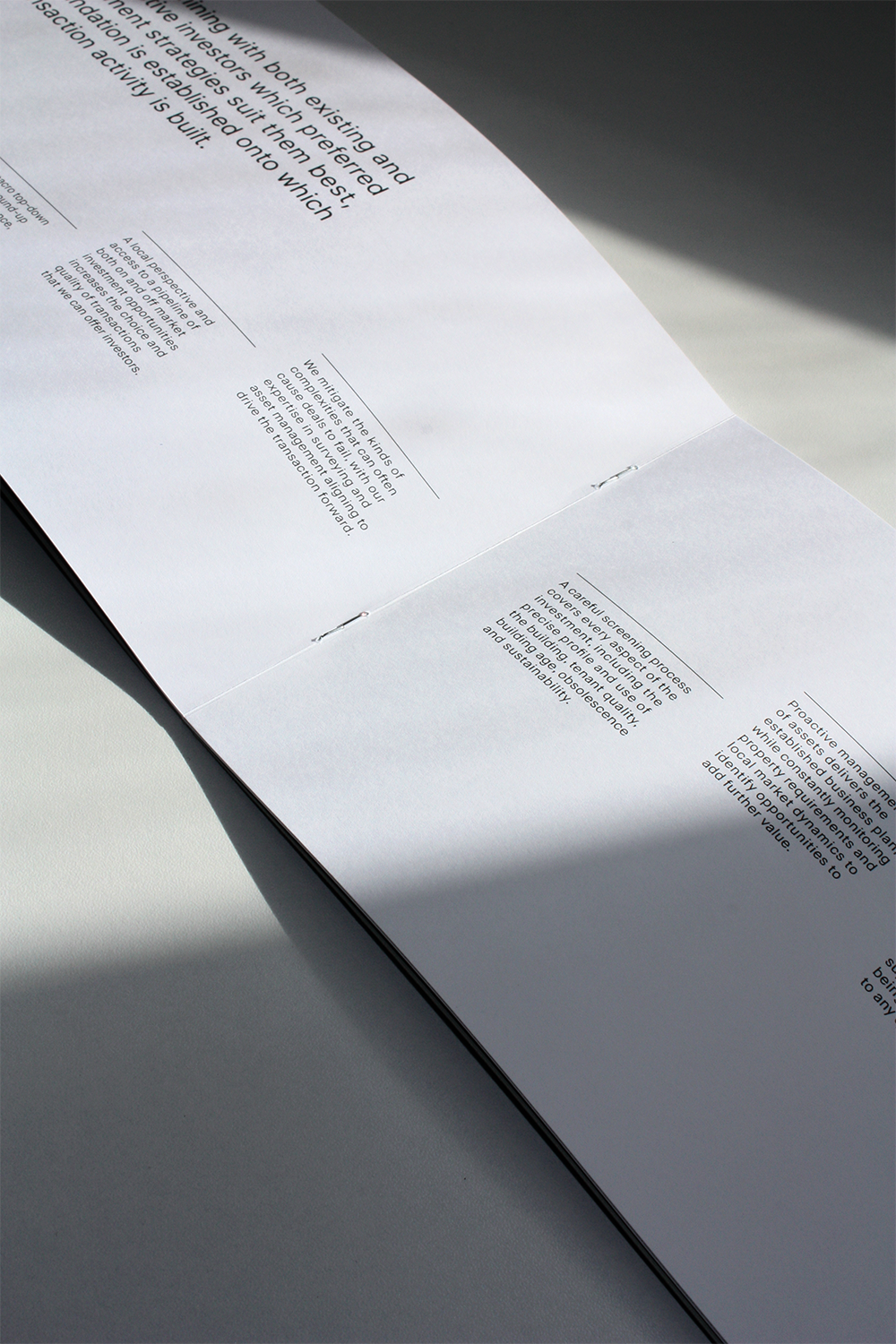 When designing print, we took the wave from the logo mark to inspire interesting compositions. 