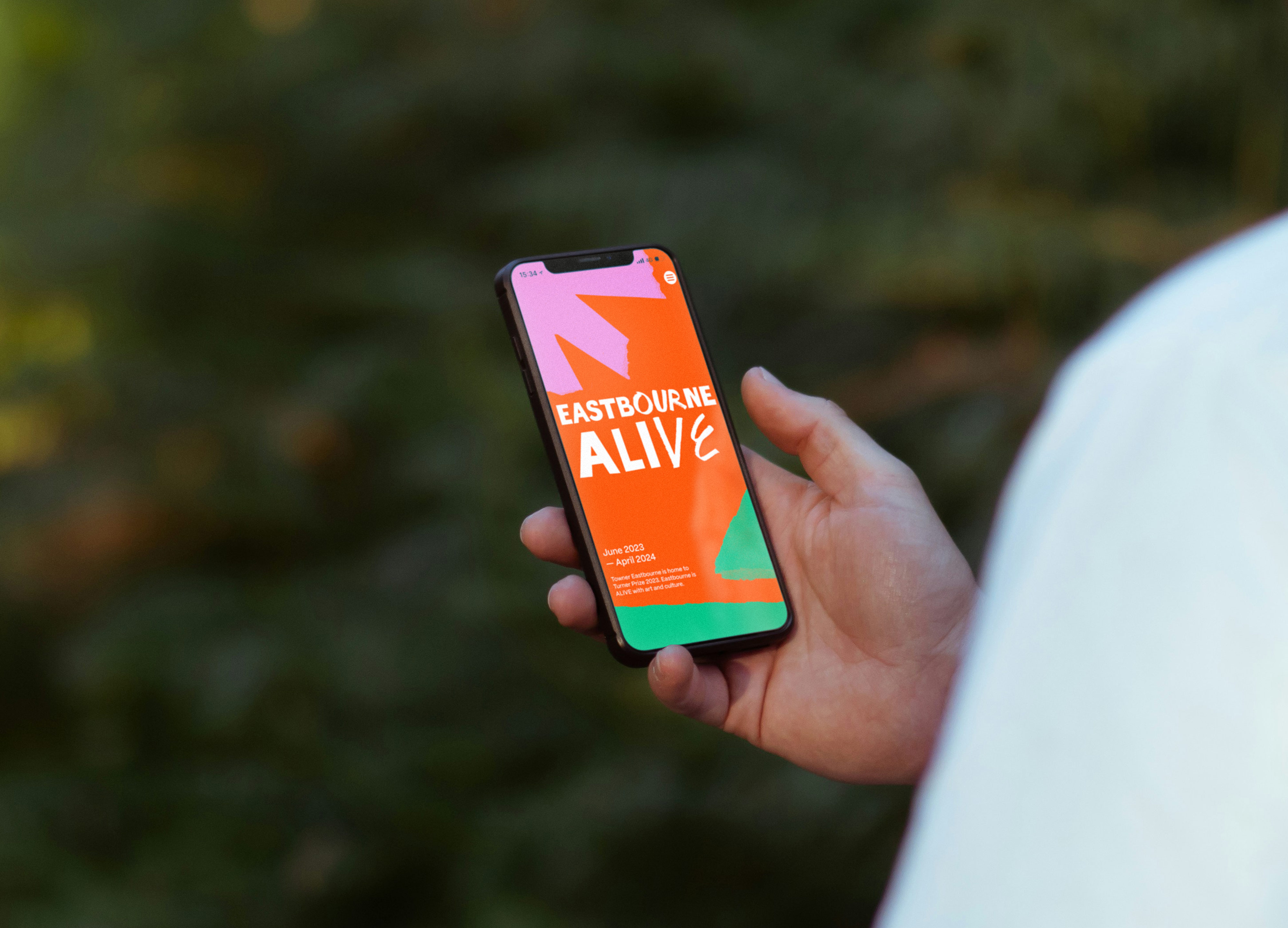 Eastbourne Alive responsive website design and build by Two Pens shown on a smart phone