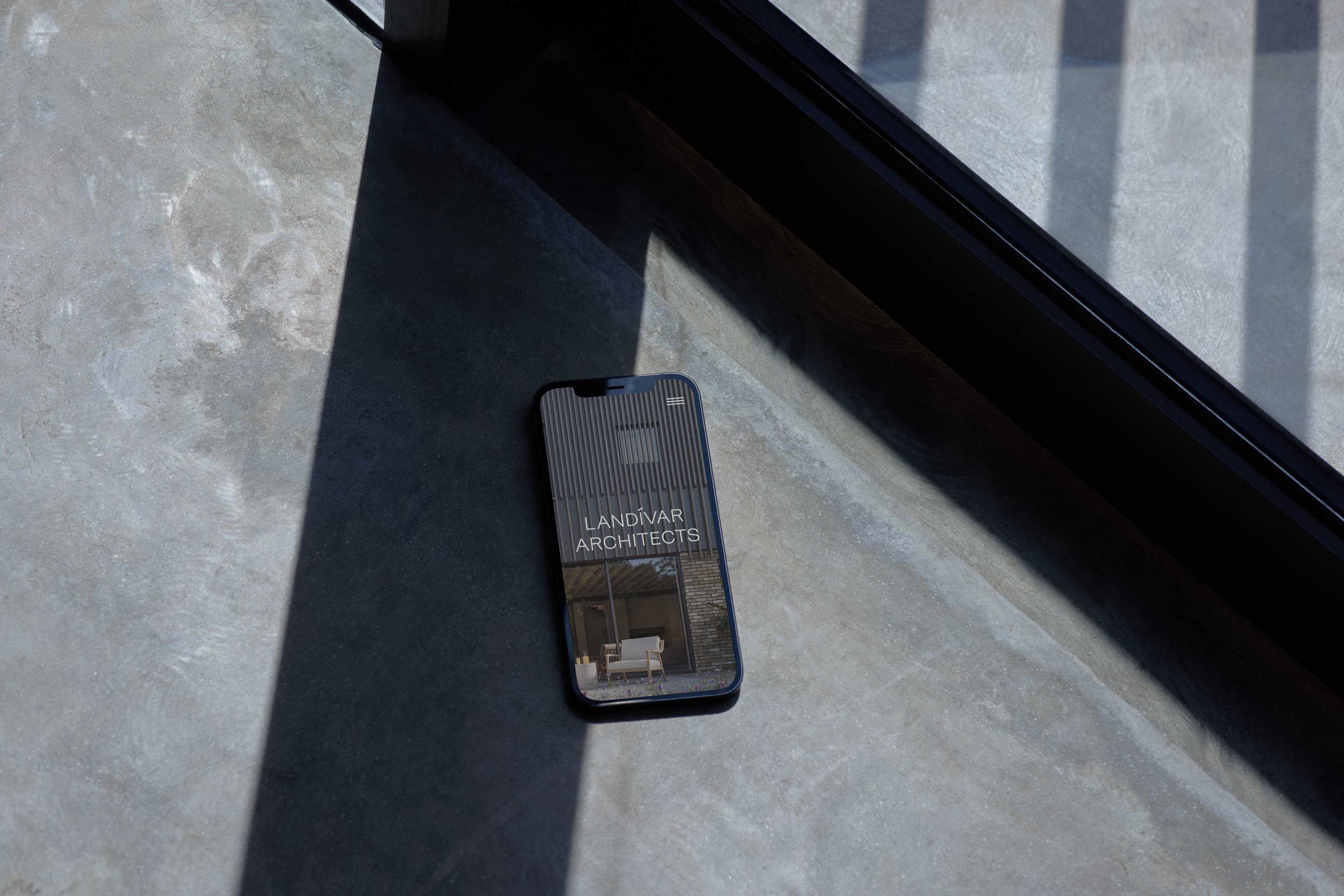 Landívar Architects Branding shown on iPhone 